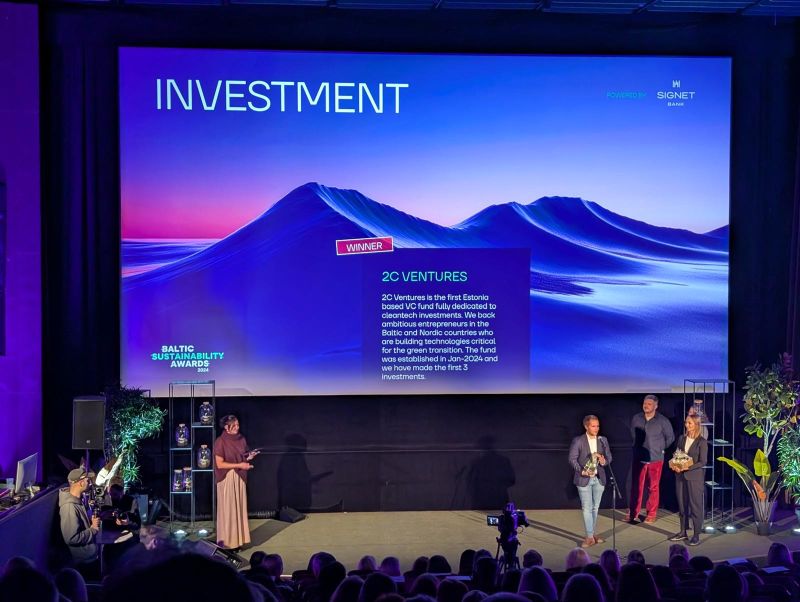 One of ÄIO's investor 2C Ventures on the stage - investment of the year award!